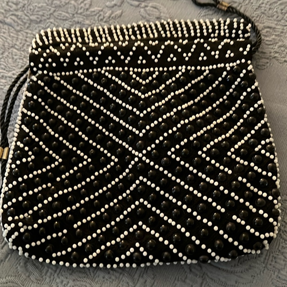 Beaded reversible handbag.
